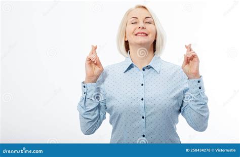 Half Length Portrait Of Beautiful Dreamy Blonde Wearing Blue Classic Blouse Standing Crossing