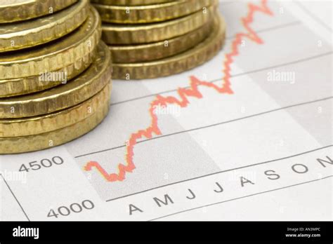 Stacked Coins On Chart Stock Photo Alamy