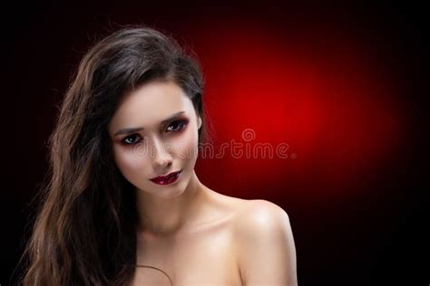 A Beautiful Glamorous Brunette Girl With Naked Shoulders Wearing Stock Image Image Of Makeup