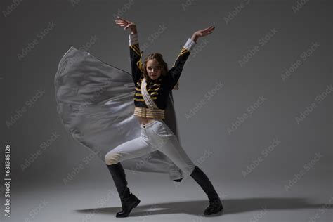 A Glamorous Blonde In A Carnival Uniform With Epaulettes Posing With Pretentious Poses A Show