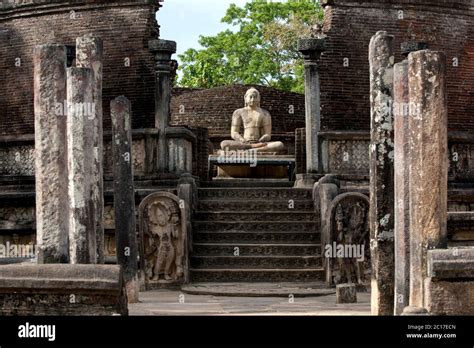 A Seated Buddha Statue Within The Vatadage Which Forms Part Of The