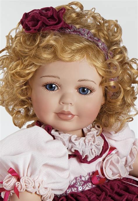 Blonde Haired Doll In Red Dress