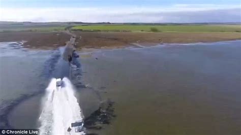 Driver Races Over Submerged Holy Island Causeway Daily Mail Online