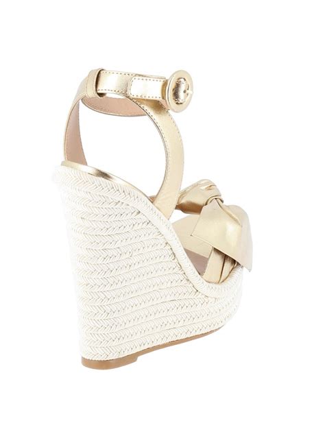 compensés semelle tressée bride noeud cuir nude cm