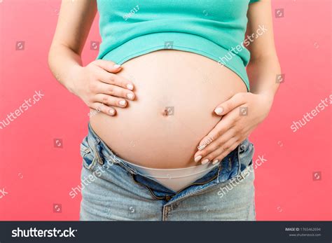 Close Naked Pregnant Womans Belly Wearing Stock Photo 1765462694 Shutterstock