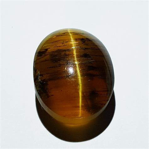 11.05 ct Natural Honey Color Oval Cabochon Opal Cat's