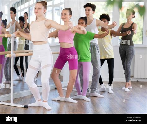 teenage girl practicing plie position  ballet  choreography