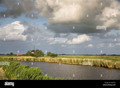 Netherlands Schermerhorn Windmills Against Dark Sky Stock Photo Alamy