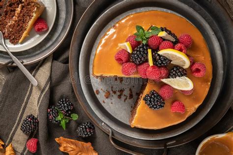 Delicious Semi Naked Chocolate Cake With Caramel Topping And Decorated With Blackberries And