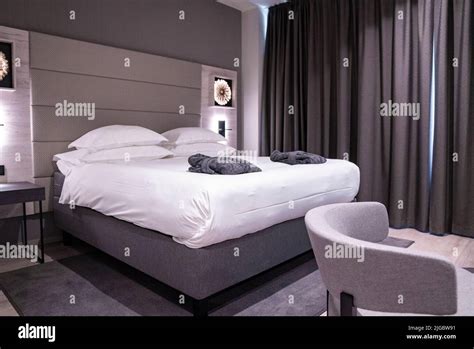 Interior of stylish modern illuminated bedroom in luxurious resort ...