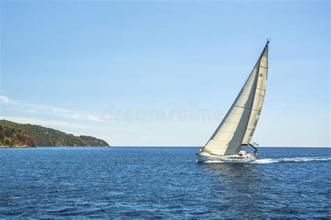 Sailing Ship Yachts With White Sails Shores Of The Aegean Sea Stock