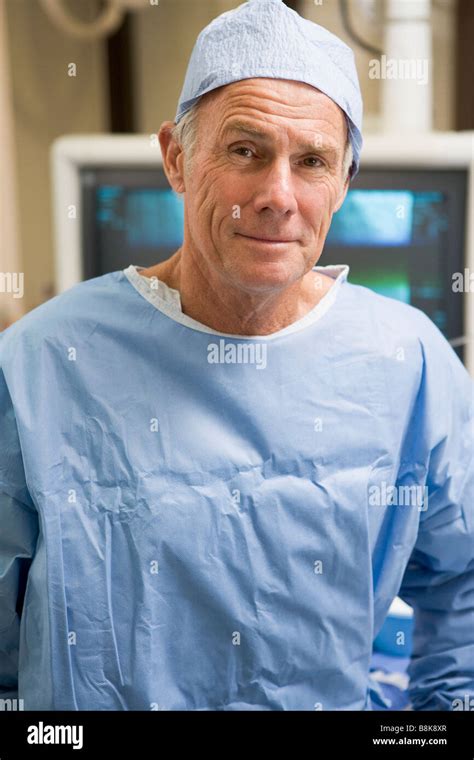 Portrait Of Surgeon In Surgical Scrubs Stock Photo - Alamy