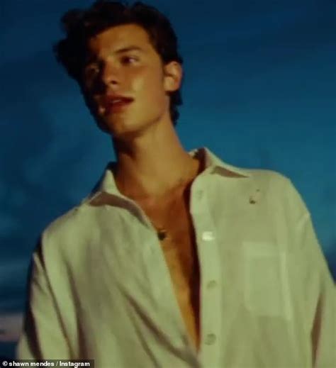 Shawn Mendes Shows Off Toned Arms In Clinging Nude Tank Top As He Greets Fans Daily Mail Online
