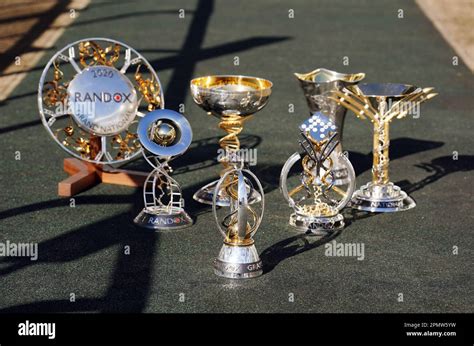 The 2023 Grand National trophy alongside previous trophies during day ...