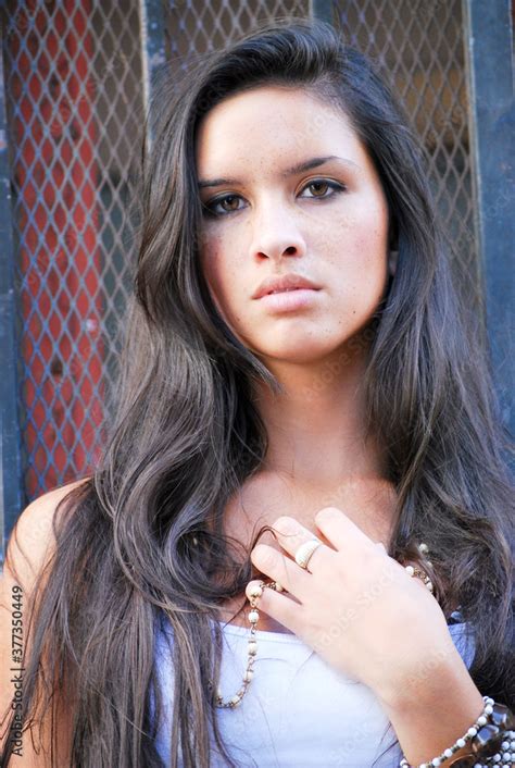 Sexy Beautiful Female Brunette Long Hair Jeans In Alley Stock Photo Adobe Stock