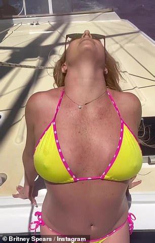 Britney Spears Wows In A Skimpy Neon Bikini After Going Topless To Tan