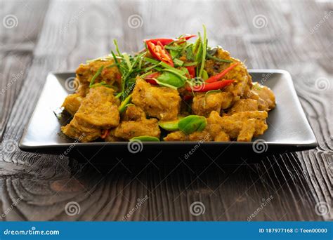 Stir Fried Pork Ribs Red Curry Paste And Coconut Milk Stock Photo