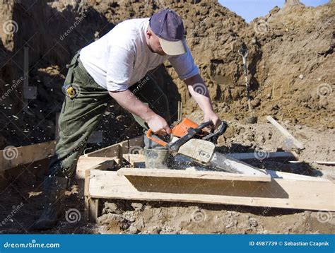 chainsaw cutting stock image image  chainsaw worker