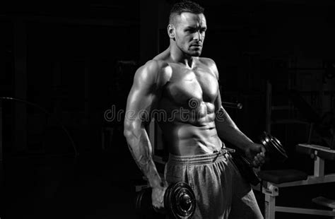 Man Naked Torso Dumbbells Sportsman In Gym Sporty Exercises Male Six Packs Stock Photo