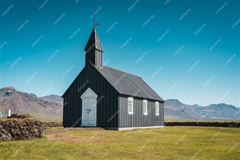 Premium Photo Budakirkja Is The Famous Black Church In Summer At Iceland