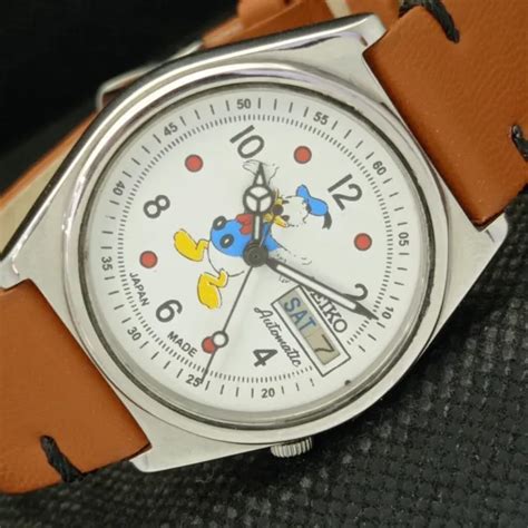 VINTAGE SEIKO CARTOON DIAL AUTOMATIC 7009A JAPAN MENS WHITE WATCH 571a