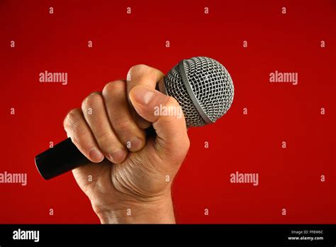 Microphone Hand Holding Sound Hi Res Stock Photography And Images Alamy