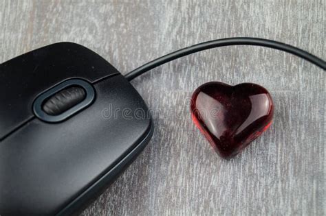 Im Your Eternal Cheerleader A Mature Husband Affectionately Kissing His Wife Stock Photo