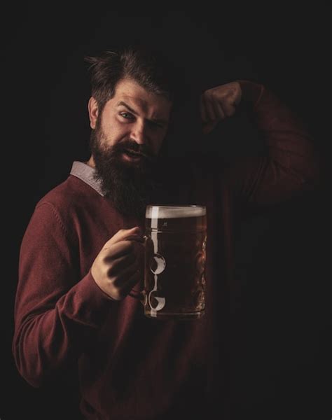 Premium Photo Man Holding Mug Of Beer Bearded Man Drinking Lager Beer