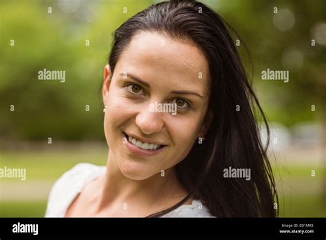 Portrait Of A Beautiful Brunette Standing Stock Photo Alamy
