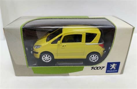 Peugeot 1007 Amarillo 1 64 3 Inches NOREV Nuevo Caja Cartón eBay