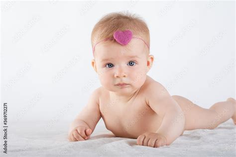 Cute Naked Baby Lies On His Stomach On White Background Baby Of European Appearance Decoration