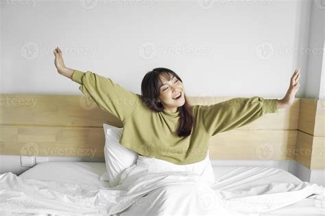 Portrait Of Beauty Happy Asian Woman Awaking Wake Up On The Bed Young Beautiful Asian Girl