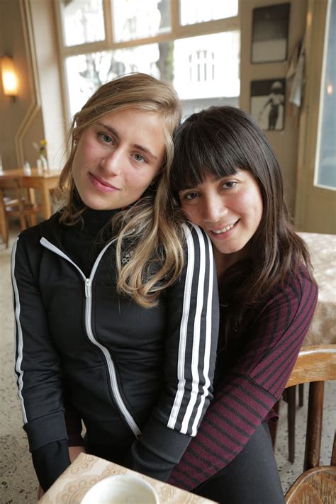 Two Sexy Amateur Models Pose Nude And Touch Their Shaved Pussies