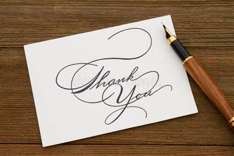 Thank You Greeting Card With A Fountain Pen On Wood Desk Stock Image