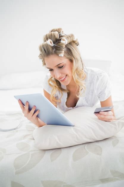 Cheerful Pretty Blonde Wearing Hair Curlers Buying Online Premium Photo