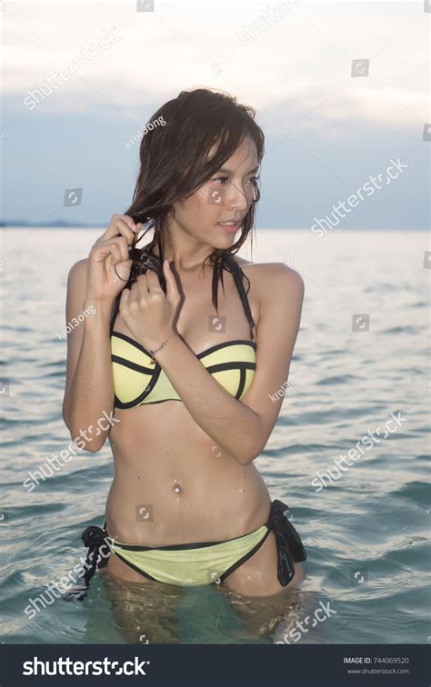 Sexy Asian Woman Yellow Bikini Two Stock Photo 744069520 Shutterstock