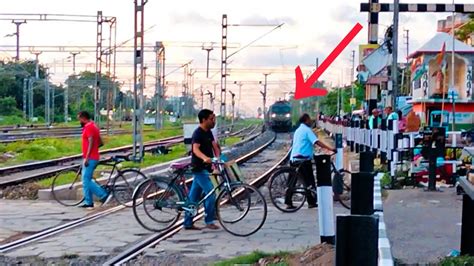 Freight Train Passing Through A Very Busy Railgate Indian Railways