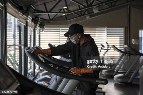 Cleaning Gym Equipment Photos And Premium High Res Pictures Getty Images