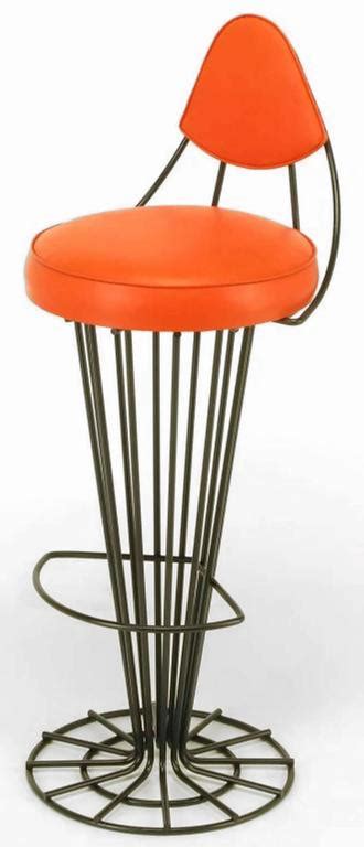 Set Of Four Sculptural Black Wrought Iron And Persimmon Bar Stools For