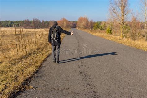 Mature Hitchhiker Walking On A Road Stock Image Image Of Ukrainian Coat