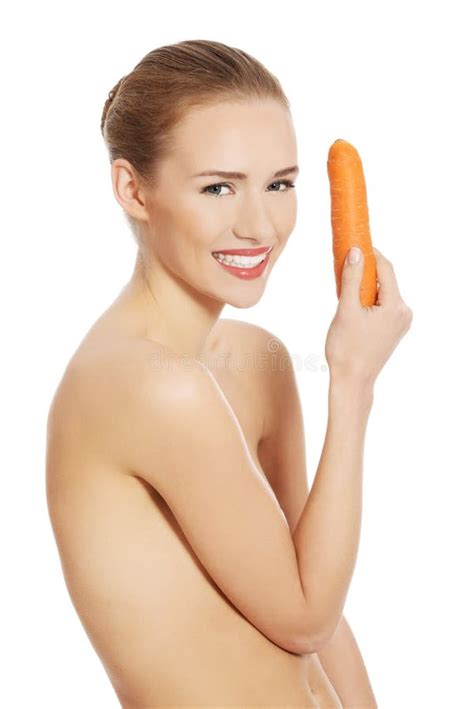 Portrait Of Nude Woman Holding A Carrot Stock Image Image Of Carrot Eating 47077979