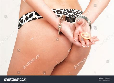 Naked Girl Handcuffs Holding Condom Stock Photo Shutterstock