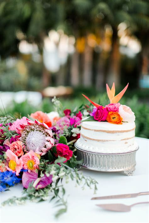 Single Tier Naked Cake With Bright Tropical Flowers