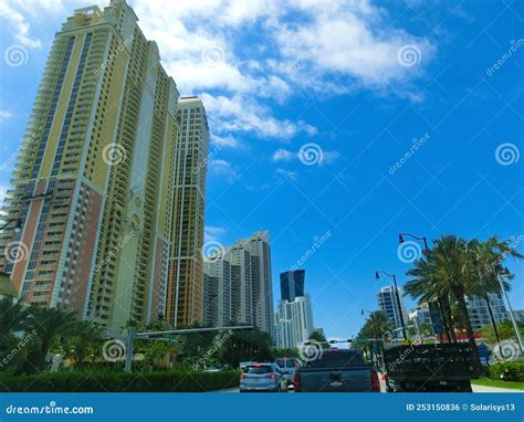 Modern Apartment Buildings With Palm Trees At Miami View From Road