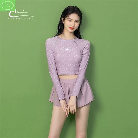 Mới 2024 Bộ bơi Bikini nữ dài tay chống nắng quần đùi 2 lớp họa tiết chữ cao cấp phong cách trẻ