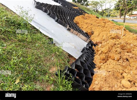 Slope Erosion Control Grids Sheets And Earth On Steep Slope Stock