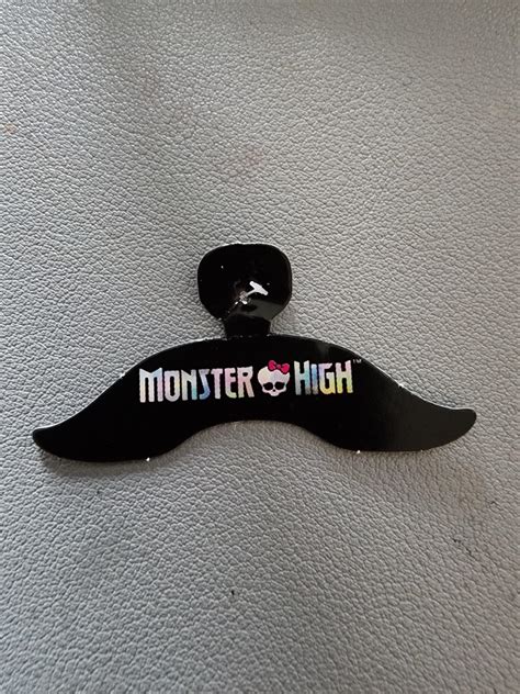 I KNOW it's a hanger, but my brain keeps saying "Monster High Moustache