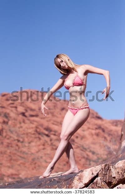 Sexy Blonde Woman Posing On Red Stock Photo 37824583 Shutterstock