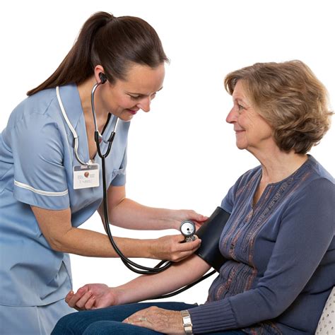 Nurse checking patient's vital signs hospital room healthcare image