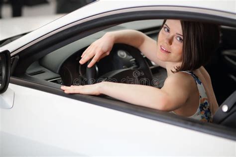 Portrait Of A Beautiful Brunette Driving A Stock Image Image Of Design People